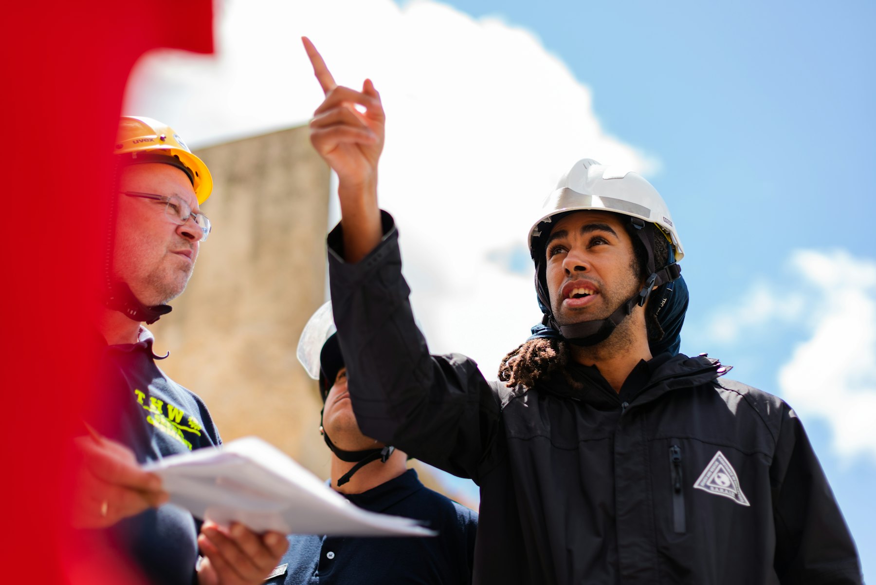 Engineers reviewing a cooling tower